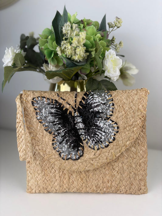 Bolso mariposa negro y plata