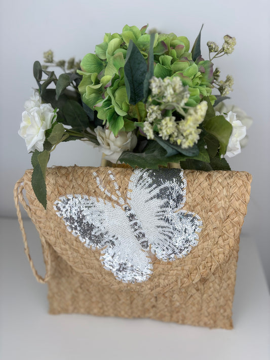 Bolso mariposa blanco y plata