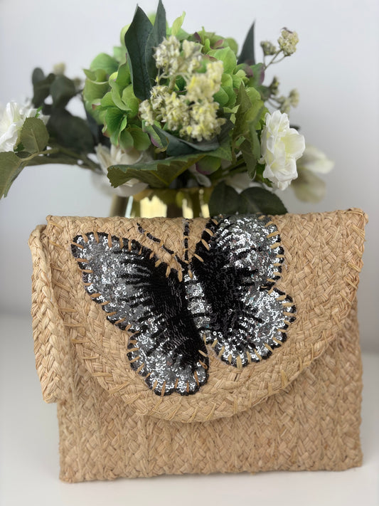 Bolso mariposa negro y plata